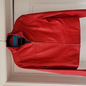 Red 100% leather jacket by Andrew Marc. Size medium.